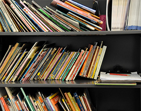 Photo of a bookshelf with books.
